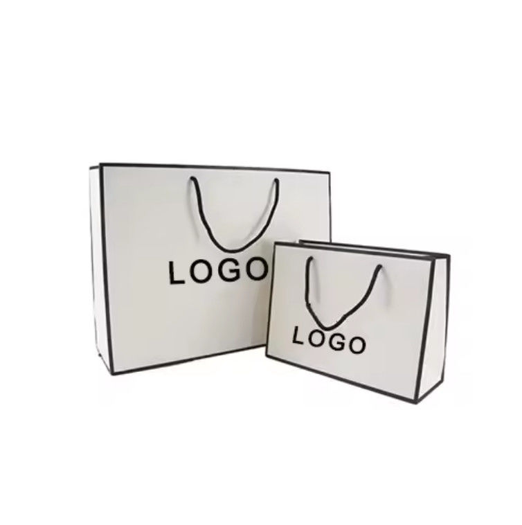 Free Design Beautiful Custom Logo Printing Art Paper Bag Gift Clothing Shipping Bag With Handle